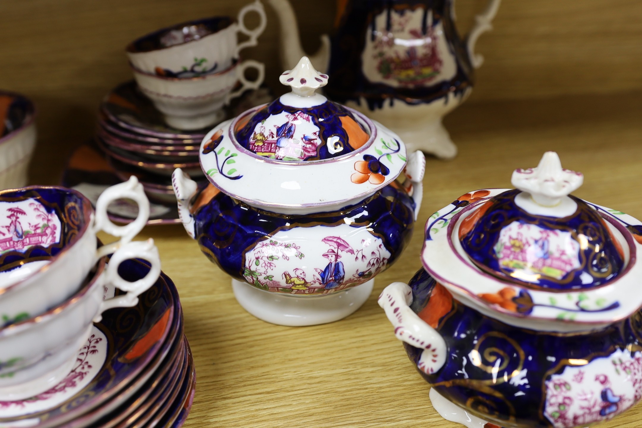 A quantity of Gaudy Welsh lustre tea wares with chinoiserie motifs